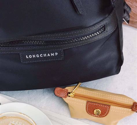 longchamp purse repair.